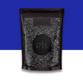 Black, gray and white pouch packaging with visible brand logo on a blue and white background