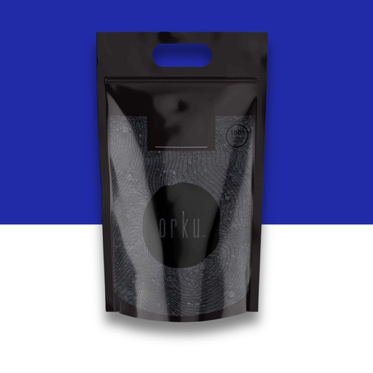 Black, gray and white pouch packaging with visible brand logo on a blue and white background
